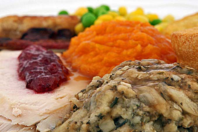 Turkey Dinner with sweet potatoes, cranberries, dressing and more by Robert Owen-Wahl/Pixabay